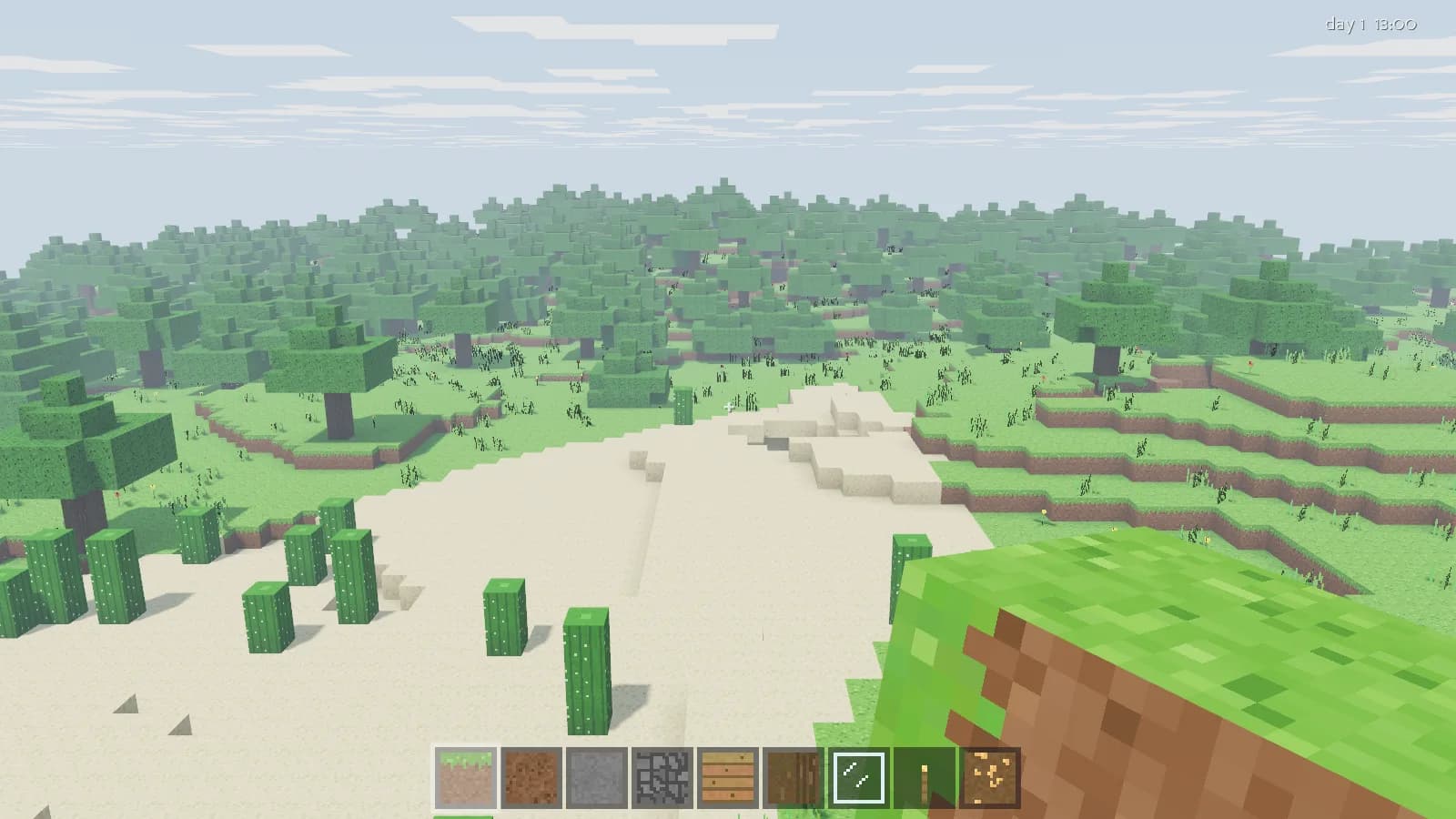 A sandy voxel desert with cacti, bordered by grassland and forest
